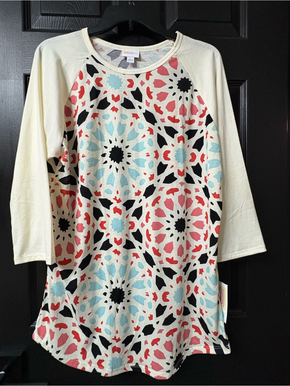LuLaRoe Cream Tunic with Coral, Aqua & Black Medallion Print